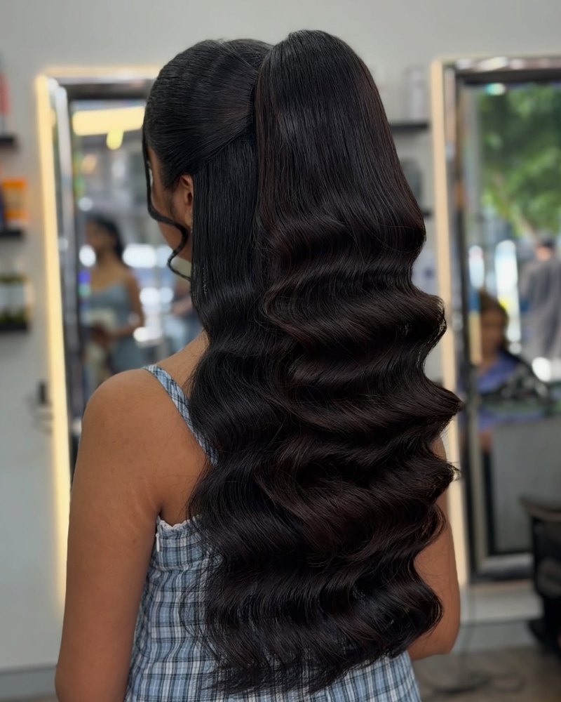 Hollywood waves from behind